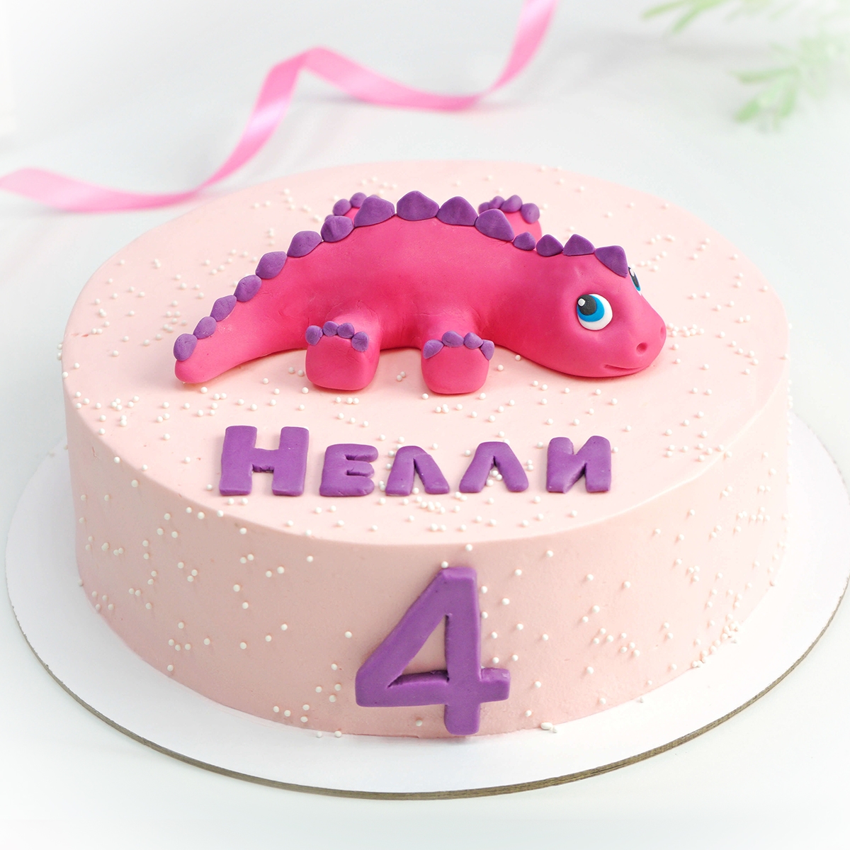 Торт с розовыми динозаврами